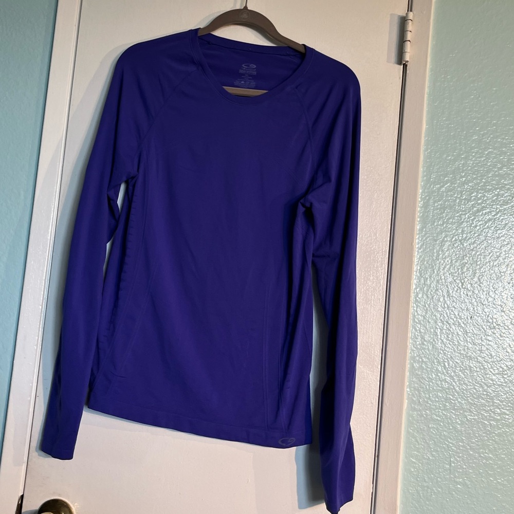 Bluish purple Champion workout layer. Thumb holes, medium weight.
